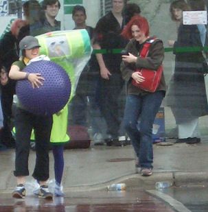 The Prince of All The Cosmos shelters from the rain