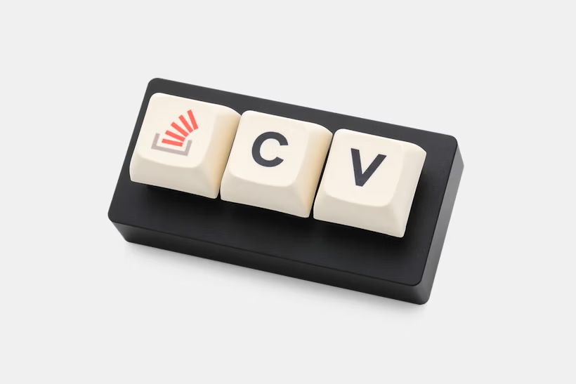 Stack Overflow: The Key Macropad. A novelty 'keyboard' with three keys, C, V and a key with the Stack Overflow logo.
